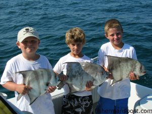 Hunter Kendall, from Asheville, NC,  Hunter Bercunias, and Tripp Hooks, from Ocean Isle, with three spadefish they hooked on pieces of jelly ball while fishing at the General Sherman. They were fishing with Capt. David Hooks, of Capt. Hook Outdoors in Ocean Isle.