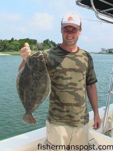 Wade Wickowski with a 4 lb. 14 oz. flounder he hooked on a Carolina-rigged spot near Bogue Inlet. He was fishing with Capt. Rob Koraly of Sandbar Safari Charters out of Swansboro.