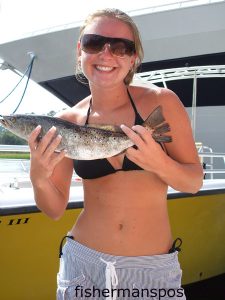 Katlin Griggs of Conway, SC, with a speckled trout caught at the Little River jetties while she was fishing with Capt. Patrick Kelly of Capt. Smiley's Fishing Charters in North Myrtle Beach.