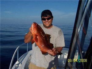 Bill Harveson, from Raleigh, with his first grouper. The 25" red fell for a cigar minnow near the Red and Whites while he was fishing with Capt. Jim Sabella of Plan 9 Charters out of Wrightsville Beach.