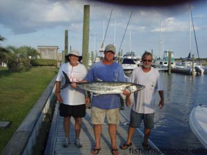 Tim Coy, from Holly Ridge, NC, with a 35 lb. king mackerel he caught while light-lining and bottom fishing with Capt. Brad Phillips of Fish Spanker Charters out of Carolina Beach. The party also hooked red grouper, American red snapper, other bottomfish, and dolphin.