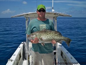 Darrell Williams, of Lake Norman, NC, with a 19 lb. gag grouper he caught on a live pogy at the Gary Ennis wreck while fishing aboard the "School'n Around."
