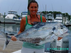Dianne Reeder, of Lexington, NC, with an African pompano she caught on king mackerel tackle her first time offshore fishing. The African fell for a live pogy near Frying Pan Tower while she was slow trolling with Capt. Butch Foster of Yeah Right Charters out of Southport.