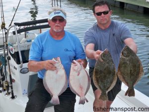 Tom Cronk and Dr. Jack Cole with four of 26 flounder they caught on bucktails and Gulp baits while onboard with Capts. Mike Taylor and Jeff Cronk of NCCHARTERFISHING recently.
