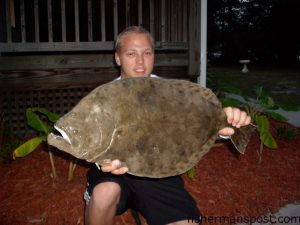 Marcus Denning with a 9.5 lb. flounder caught on a 3" Gulp shrimp. He was fishing off a dock in Cedar Point.