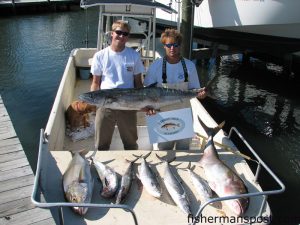 Ryan Hill and Steven Smith, from Atlantic Beach, with a 48 lb. king, amberjacks to 63 lbs., a 7.5 lb. spanish mackerel, and more kings caught on the east side of Lookout Shoals on live baits. Fish weighed at Chasin Tails Outdoors.