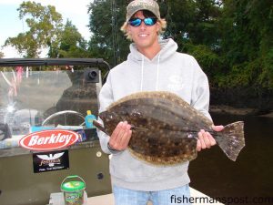 Hunter Avery, of Wilmington, with a 4.75 lb. flounder caught on a white 4" Gulp Alive Shrimp in the Cape Fear River.