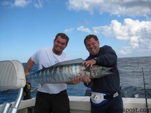 Capt. Chris MicKey and angler Ken MicKey with a 58 lb. wahoo caught while trolling just south of the Nipple on a skirted ballyhoo. 