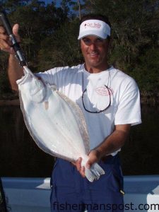 Capt. Patrick Kelly, of Capt. Smiley’s Fishing Charters out of North Myrtle Beach, with a 6.5 lb. flounder he caught in Dunn Sound on a Gulp shrimp. 