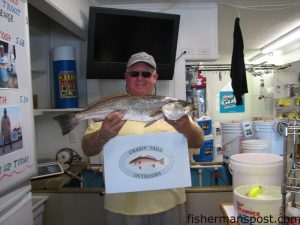 Carl Edwards, from Morehead City, with the 6.45 lb. speckled trout that has taken the lead in the Chasin’ Tails Outdoors Trout Challenge. He caught the big trout in the Core Creek area on a live shrimp under a float rig.