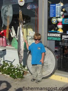 Parker Brown, of Tarboro, NC, with his fisrt king mackerel. He caught the king in the Dead Tree Hole area while fishing with his grandad, Billy Hogshire. Weighed in at Freeman's Bait and Tackle.