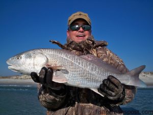 Rob Prewitt, of Holden Beach, with a 10 lb. redfish he landed while fishing with Capt. Jeff Cronk, of FishN4Life Charters out of Swansboro.
