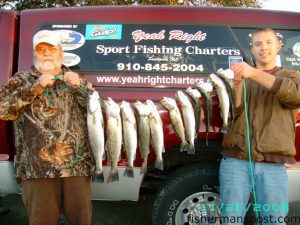Capts. Butch and Chris Foster, of yeah Right Charters out of Southport, with a stringer of speckled trout they landed near Oak Island while casting Yo-Zuri Crystal Minnows and MR17 MirrOlures.