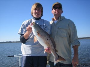 J.T. and Allen Martin with a red drum released at Lockwood Folly after it fell for a jerkbait. They were fishing with Capt. Tommy Rickman of Southport Angler Outfitters.