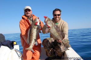 Barry Bobbitt and Gary Hurley with a pair of gag grouper taken less than 15 miles off Wrightsville Beach on Decoy jigs baited with cigar minnows.