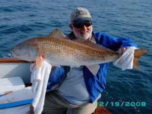 Hugh Patton, of Kannapolis, NC, with a 44" citation red drum he caught and released while bottom fishing off Oak Island with Capt. Butch Foster of Yeah Right Charters.