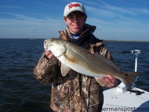 Christian Wolfe, of Wilmington, with a nice red he caught on a Redfish Magic glass minnow soft plastic. He was fishing the flats of the lower Cape Fear River with his dad, Capt. Jeff Wolfe of Seahawk Charters.