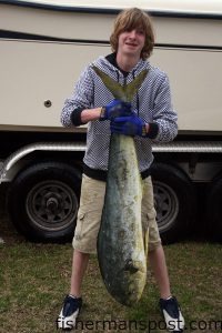 Alex True, from Wilmington, with a 28 lb. dolphin he hooked on a skirted ballyhoo 60 miles off Wrightsville Beach at the Same Ole. He was fishing on his family's 28' Grady White "Quick Release."