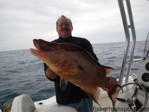 John Watson, from Wilmington, with a 17 lb. hogfish caught 35 miles southeast of Masonboro Inlet in 100' of water while he was fishing on the "Johnboat." The hog fell for a piece of cut bait.