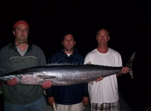 Kelly Williamson, Joe Seegers, and Chris Burrows with a 55 lb. wahoo that was caught off Ocean Isle aboard the "Marilyn Jean." The big 'hoo fell for a Black Bart San Sal Candy lure.