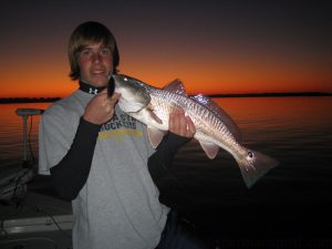 J.T. Martin with a red drum caught and released just before sunset on a Rapala Skitterwalk topwater. He was fishing with Capt. Tommy Rickman of Southport Angler Outfitters.
