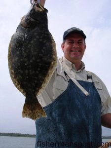 Dave Edwards, of Kinston, NC, with a flounder he hooked while fishing with Capt. Jeff Cronk of FishN4Life Charters out of Swansboro. The flatfish fell for a Gulp shrimp on a light jighead.