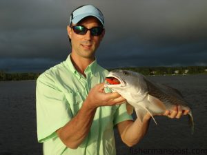 L.H. Hutchins with a red drum that fell for a topwater plugs in the backwaters near Swansboro on a late afternoon trip with Capt. Mike Taylor of Taylor-Made Charters.