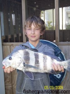 Garrison (age 12) with a 2.61 lb. black drum he hooked while bottom fishing from Surf City Pier.