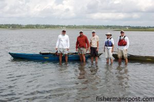 Jimbo Meador, Chris Tryon, Ryan Meddock, Shanna Chastain, and Caleb get back to the boats after taking a break on the Masonboro Island beachfront.