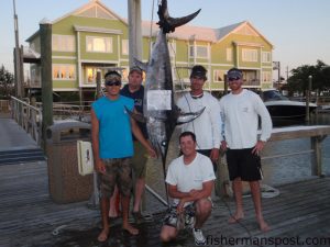 Angler Jim Hobbs hooked this 150 lb. swordfish on a rigged squid while fishing 75 miles off Wrightsville Beach in 1000' aboard the "Reel Jim" with Capt. Russ Phipps.