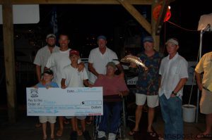 Atlantic Beach’s “Maggie” crew collecting their winnings for taking the number one spot in the billfish release category of the Cape Fear Blue Marlin Tournament. The anglers released a total of five white marlin and a sailfish to earn 750 points, handily topping the compeition.