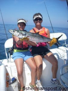 Birdie Thaggard (age 10), from Brighton, MI, with her first king mackerel, weighing 14.13 lbs. The king fell for a pink-skirted cigar minnow at Christmas Rock while She was fishing with Debra and Taylor Perdue on the "Reel Return."
