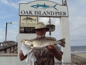 Jim Wheeler, of Winston Salem, NC, with a 3.7 lb. speckled trout he hooked off Oak Island Pier on a live shrimp.