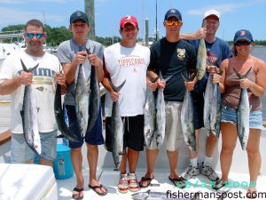 Mike, Katie, Kyle, and Ryan Pignatiello, David Casasanta, and Alex Weber with evidence that the kings are chewing around the Horseshoe. They hooked the king mackerel on dead cigar minnows while trolling with Capts. Butch and Chris Foster of Yeah Right Charters out of Southport.