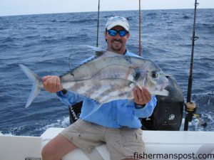 Robert Hughes, of Sunset Beach, with an African pompano he hooked on a diamond jig in 110' of water. He was fishing with Todd Helf, Tommy Lytton, and Brian Richard aboard the "Almost There."