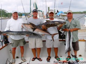 Bud Abbott, David and Gary Wyatt, and Darren Kenyon with a barracuda, an almaco jack, a cobia, and a few kings they caught while light-lining and bottomfishing near Frying Pan Tower. They also picked up some grouper, sea bass, triggers, and beeliners while fishing with Capts. Butch adn Chris Foster aboard the "Yeah Right II" out of Southport.