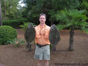 Dr. Jeff Wallen, of Myrtle Beach, SC, with 4.9 and 6 lb. flounder he hooked on live mullet near Ocean Isle Beach.