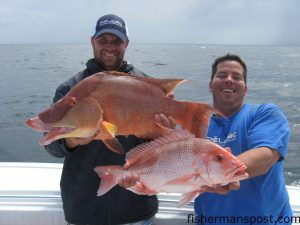 Lee Frick and Jeremy Foster with a hogfish and an American red snapper they caught 45 miles off Shallotte Inlet aboard the 32' Yellowfin "Hooyah."