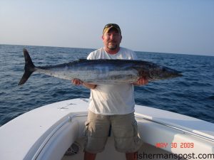 Mike Shearin with a 50 lb. wahoo he hooked on his first trip into the ocean. The hoo hit a red/black Ilander near the Same Ol' while he was fishign with Jammie Ezzell.