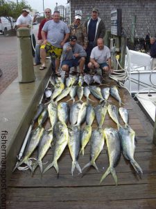 Ralph Presnell and crew, from Durham, NC, with a catch of dolphin and a pair of yellowfins they hooked near the Big Rock on Carolina lures and ballyhoo. They were fishing out of the Morehead waterfront with Capt. Pete Zook aboard the "Energizer."