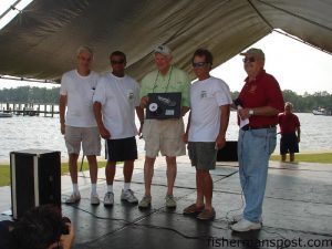 The Down East Guide Service crew accepts the award for first place at the Oriental Rotary Tarpon tournament. Photo courtesy of Ashley and Carol Erwin from the Whittaker Pointe Marina.