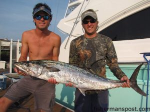 Buddy Smith and Greg Winesette, from Myrtle Beach, SC, with a 32.7 lb. king mackerel that fell for a live pogy less than half a mile off Sunset Beach Pier.