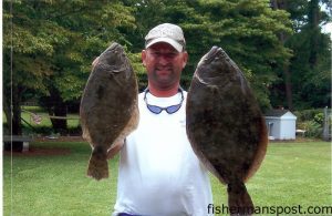 Brad Francis, of Wilmington, with a 7.18 lb. (23.5") and a 4 lb. (19") flounder. They were caught in the lower Cape Fear River near Southport.