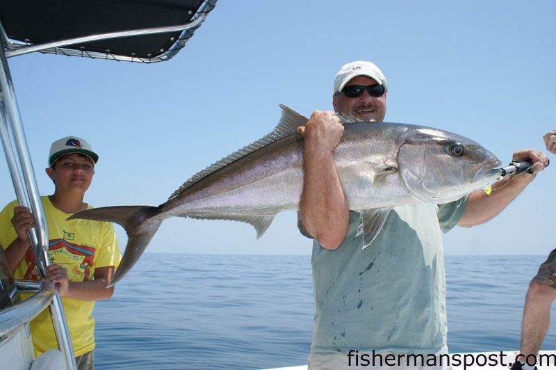 Chris Johnson with an amberjack he hooked on a 4 oz. bucktail tipped with a Gulp bait at an Artificial reef off Bogue Inlet. He was fishing with Capt. Chesson O'Briant of CXC Fishing.
