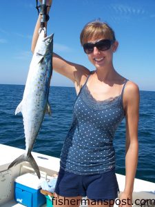 Rachel Kauffman, from Durham, NC, with a 5 lb. class spanish mackerel she hooked on a live pogy off Bogue Inlet while fishing with Capt. Rob Koraly of Sandbar Safari Charters.