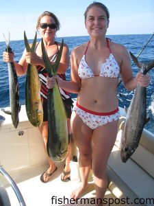 Holly Hendrickson, from Wendell, NC, and Traci Price, from Wilmington, with dolphin and kings they hooked at the Nashville while trolling with Tim Price. Yellow-skirted ballyhoo fooled most of the fish.