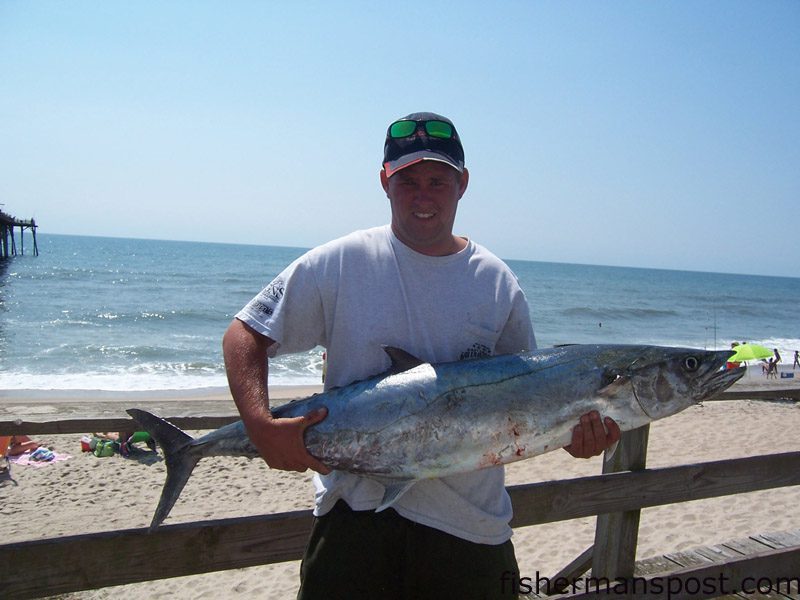 Tim Keziah, of Stanley, NC, with a 45.5 lb. king mackerel he hooked on a live bait pinned to a king rig from Kure Beach Pier.
