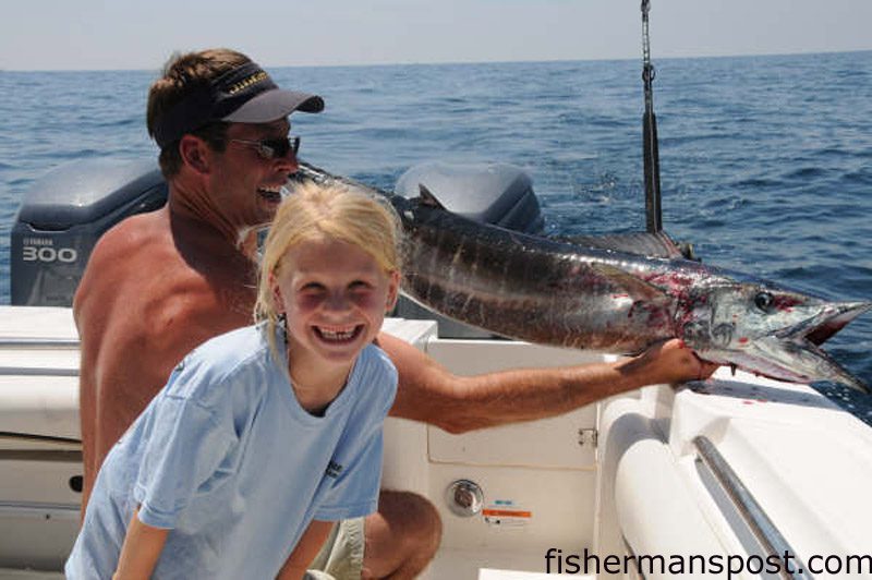 Laurin Schad (age 7) caught this 40 lb. wahoo at the Horseshoe on a dead cigar minnow while fishing with her father on the "Diggin' It."