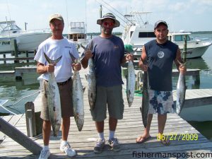 Tim Creech, Brandon Creech, and Tim Chavez with king mackerel they hooked near the C Buoy out of Bogue Inlet. They were fishing aboard the "Green Dolphin."