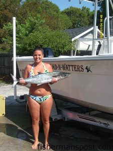 Summer Feimster, from Wilmington, with her first king mackerel. The king took a live pogy in 35' of water just offshore of Carolina Beach Inlet.